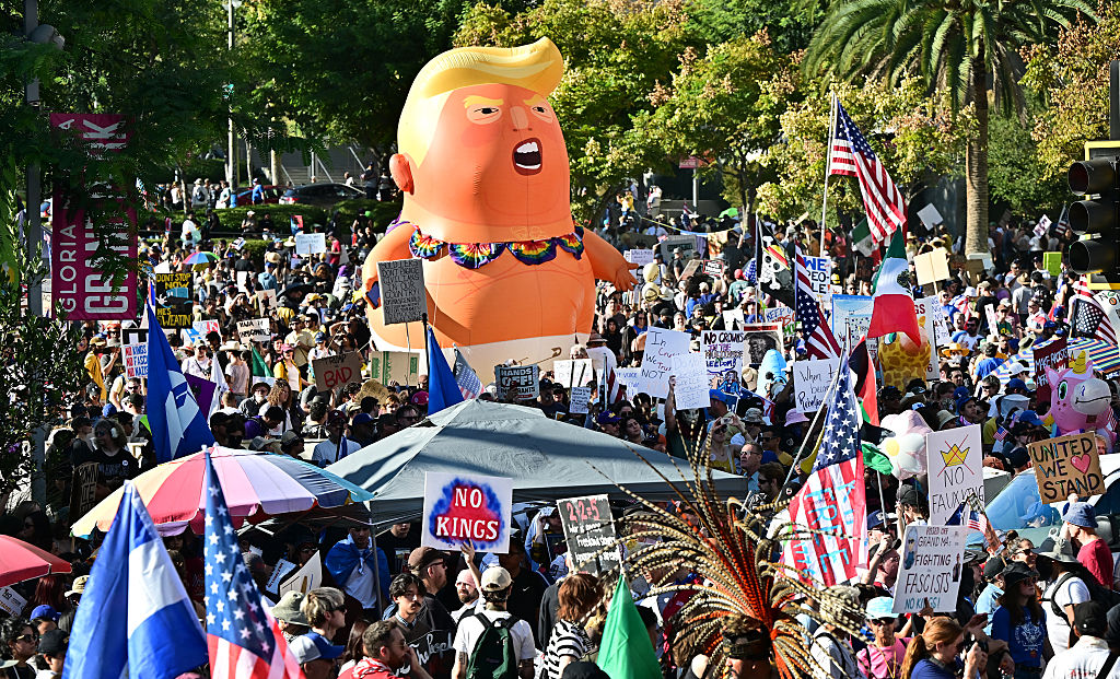 Protesters rally during the "No Kings" national day of protest in Los Angeles, California on October 18, 2025.