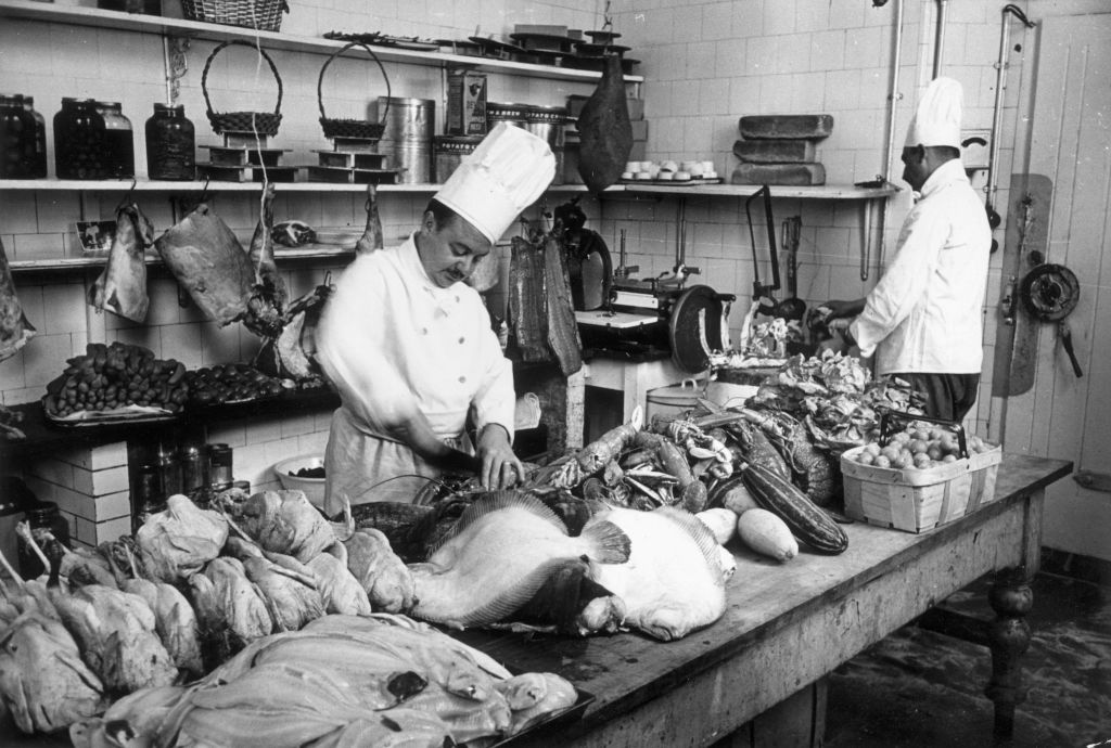 Chefs at work in the kitchens of the Grand Hotel in Torquay, England, on August 30, 1947.