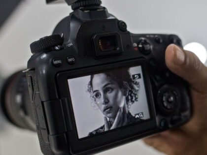 Valery Lopez is seen in the screen of a camera during a photo shoot to make content for her OnlyFans profile, in Caracas, Venezuela, on December 1, 2020. 
