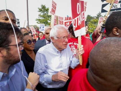 Bernie Sanders walks the picket line with striking auto workers at the General Motors Detroit-Hamtramck Assembly Plant on September 25, 2019. 