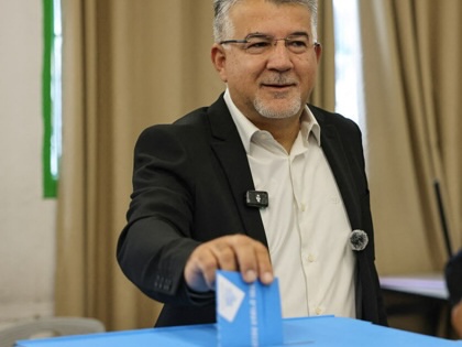 Yousef Jabareen casts his ballot in the 2026 Israeli legislative elections.