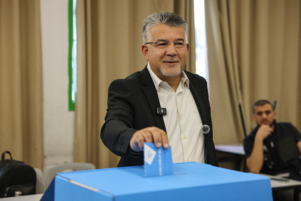 Yousef Jabareen casts his ballot in the 2026 Israeli legislative elections.