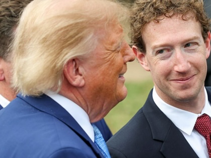 Mark Zuckerberg looks at Donald Trump as he holds a press briefing with AI executives following a meeting on artificial intelligence outside the White House on September 29, 2026 .