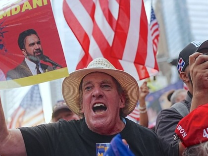 Demonstrators march through Lower Manhattan on September 9, 2026, to protest Mayor Zohran Mamdani's attendance at the upcoming 9/11 memorial ceremony.