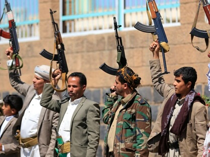 Fighters loyal to the Houthi authorities take part in a rally to recruit more fighters in Sana'a on October 7, 2026.