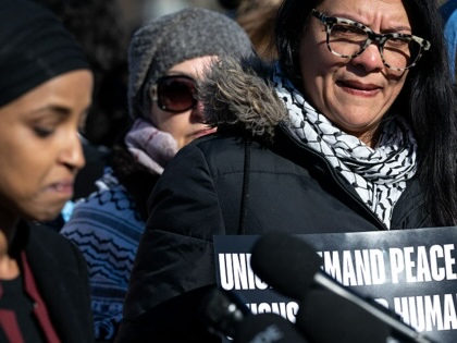 Ilhan Omar speaks alongside Rashida Tlaib during a press conference with union leaders and supporters of a ceasefire in Gaza on December 14, 2023, in Washington, DC.