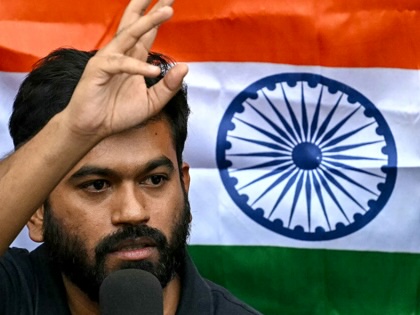 Cockroach Janta Party (CJP) founder Abhijeet Dipke speaks during a press conference in New Delhi on October 15, 2026, amid ongoing protests against India's chief election commissioner, Gyanesh Kumar.
