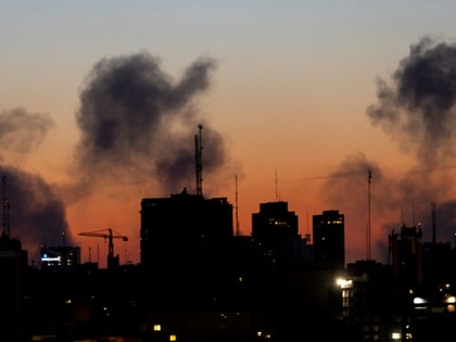 A skyline view shows smoke rising from a March 6, 2026 airstrike in Tehran.