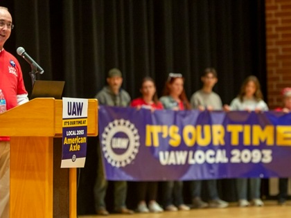 United Auto Workers President Shawn Fain speaks as UAW members rally for better wages as contract negotiations begin with American Axle (aka Dauch Corp.).