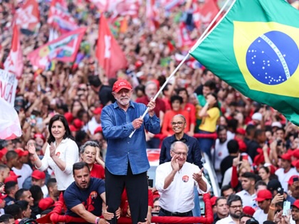 Luiz Inácio Lula Da Silva, incumbent president of Brazil and presidential candidate for Partido dos Trabalhadores (PT), waves a Brazilian flag during a rally ahead of the presidential runoff at Avenida Paulista on October 24, 2026, in São Paulo, Brazil.