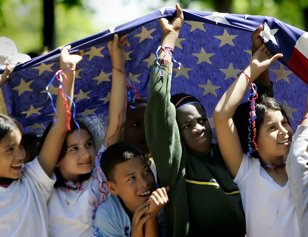 TOPSHOT-US-IMMIGRATION-PROTEST-FLAG