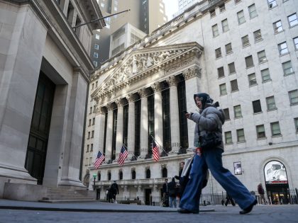 Traders At The New York Stock Exchange As Stocks, Bonds, Dollar Get Hit Amid US-Europe Clash