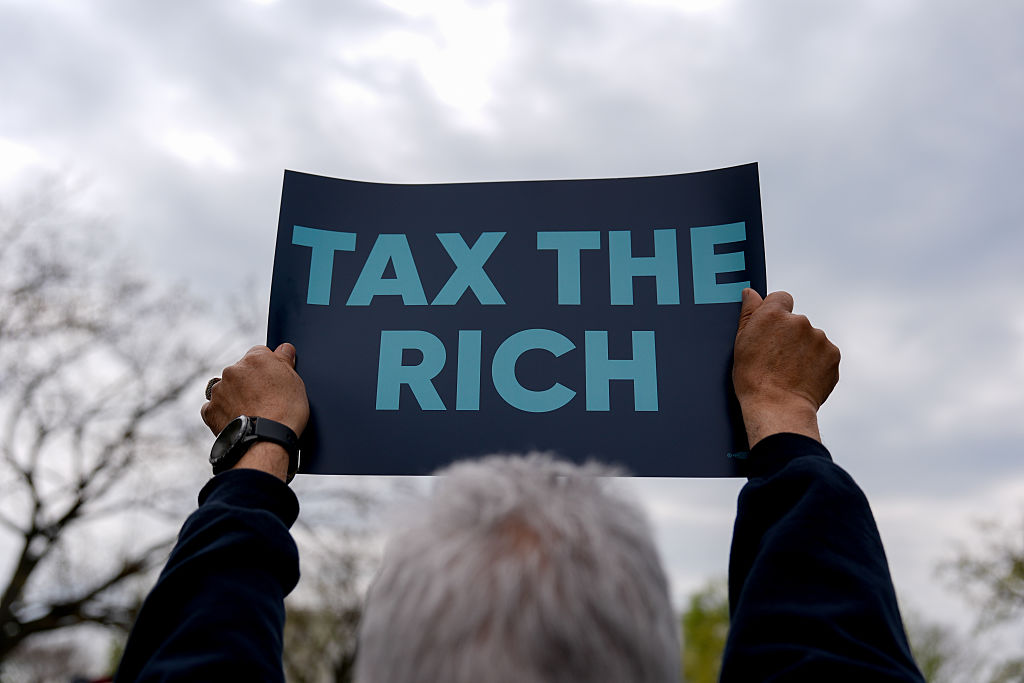 Demonstrators Protest Tax Breaks For Billionaires And Corporations At US Capitol