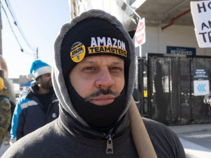 Amazon workers on strike outside Queens, New York distribution facility
