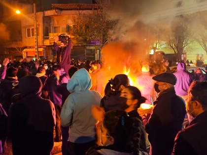 Fires are lit as protesters rally on January 8, 2026, in Tehran, Iran.