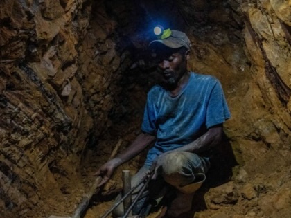 A man mines for gold in the South Kivu province of the Democratic Republic of the Congo. 