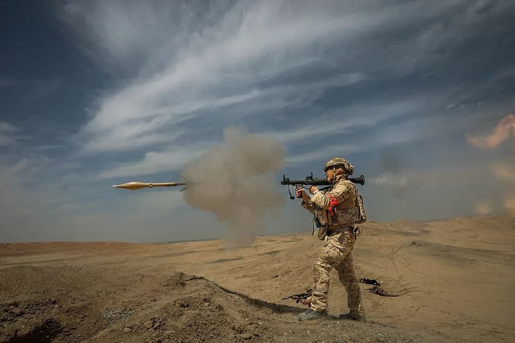 A member of the Islamic Revolutionary Guard Corps participates in a military exercise aimed at "increasing combat capabilities" in Tehran province, Iran, on May 12, 2026.