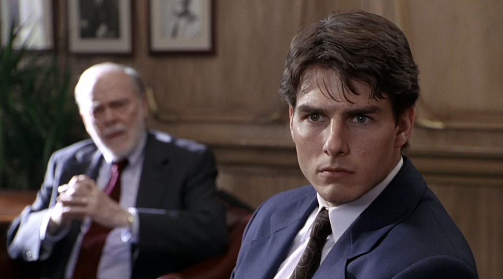 Still from The Firm with Tom Cruise's character looking intently.