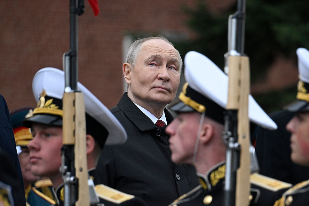Russian President Vladimir Putin attends a ceremony to lay flowers at the Tomb of the Unknown Soldier by the Kremlin wall in central Moscow on May 9, 2026.