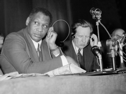 Paul Robeson listens to a speech during the Peace Partisans World Congress in Moscow on April 20, 1949.