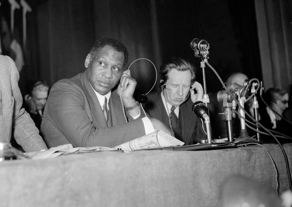 Paul Robeson listens to a speech during the Peace Partisans World Congress in Moscow on April 20, 1949.