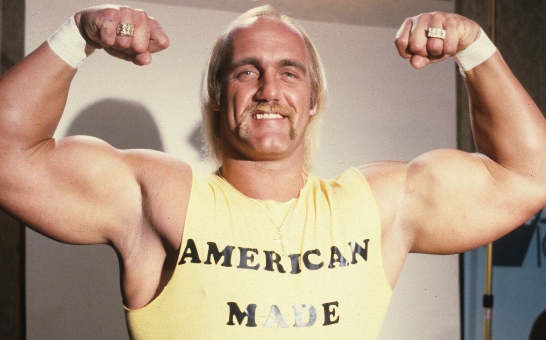A portrait photograph of Hulk Hogan flexing his muscles.