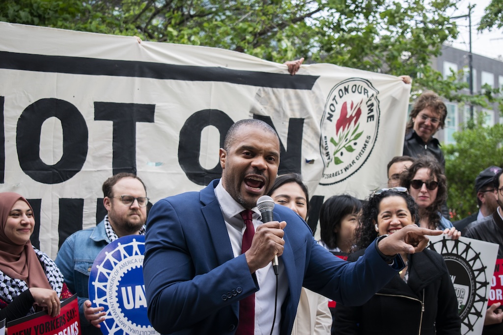 Senator Jabari Brisport speaks at a press conference in Queens.
