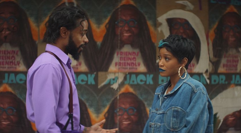 One man and one woman face each other in a still from I Love Boosters.