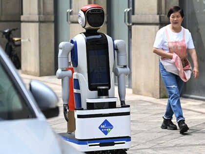 A traffic robot is on duty on the street on May 13, 2026, in Hangzhou, Zhejiang Province of China.