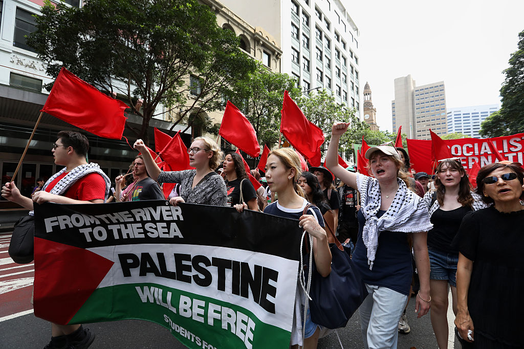 Pro-Palestine protesters march through the Central Business District (CBD) on February 22, 2026, in Sydney, Australia.