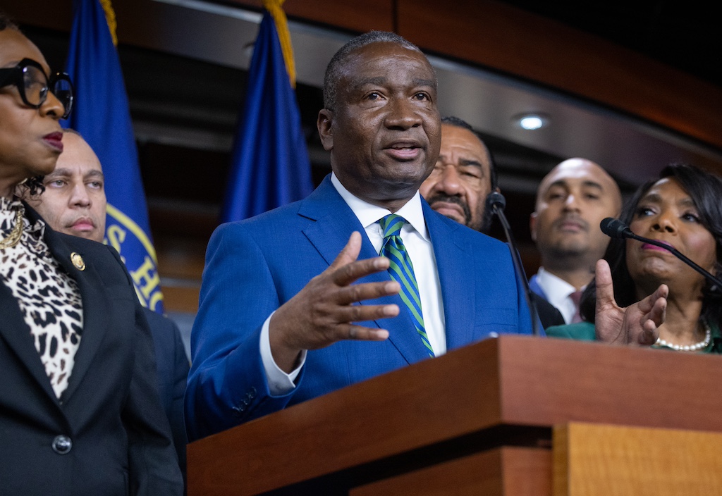 Congressman Cleo Fields speaking at a podium.