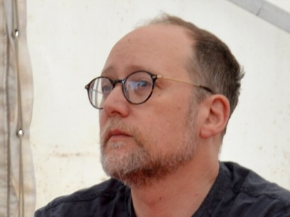 A photograph of writer David Renton.