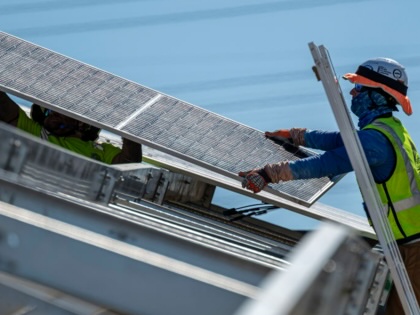 Contractors install solar panels at the Phillips 66 Rodeo Renewable Energy Complex in Rodeo, California, on Wednesday, July 31, 2024.