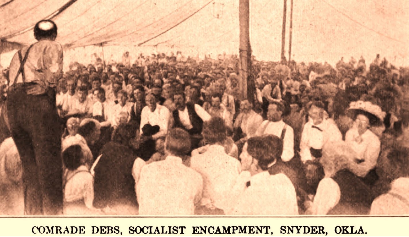 Photograph of Eugene Debs in a crowd at an early twentieth-century Socialist Party encampment in Snyder, Oklahoma.