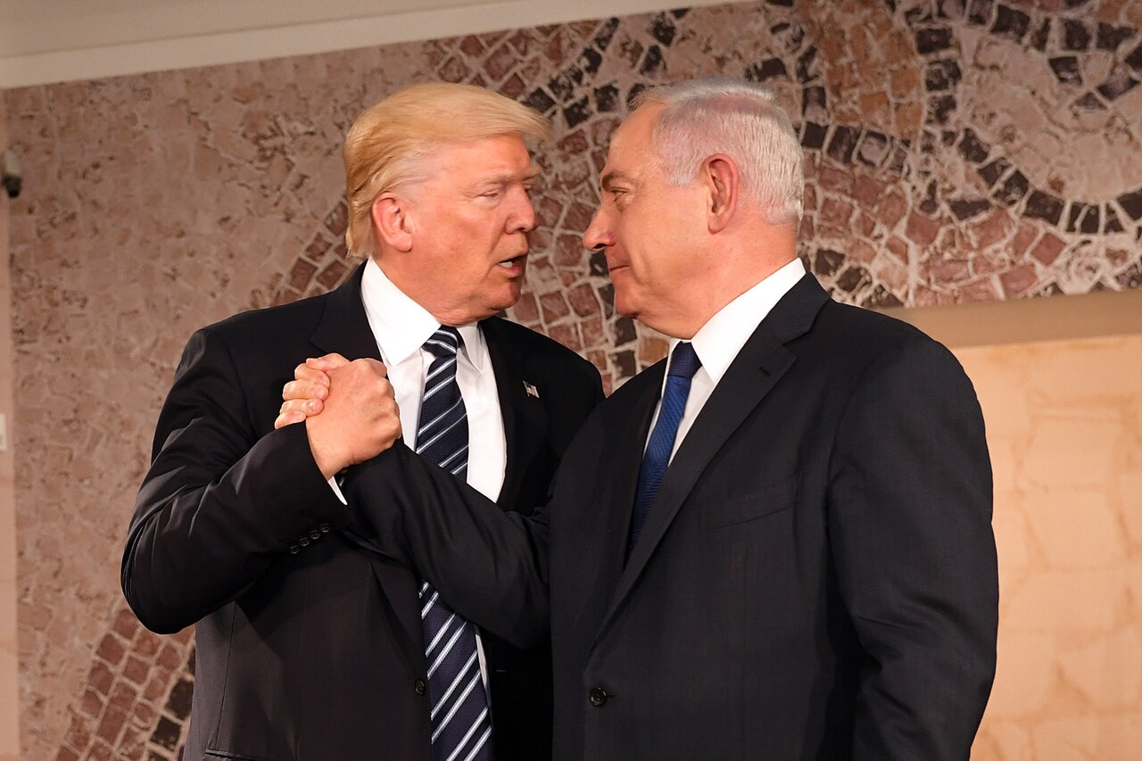 Donald Trump clasps hands with Benjamin Netanyahu at the Israel Museum in Jerusalem, May 23, 2017.
