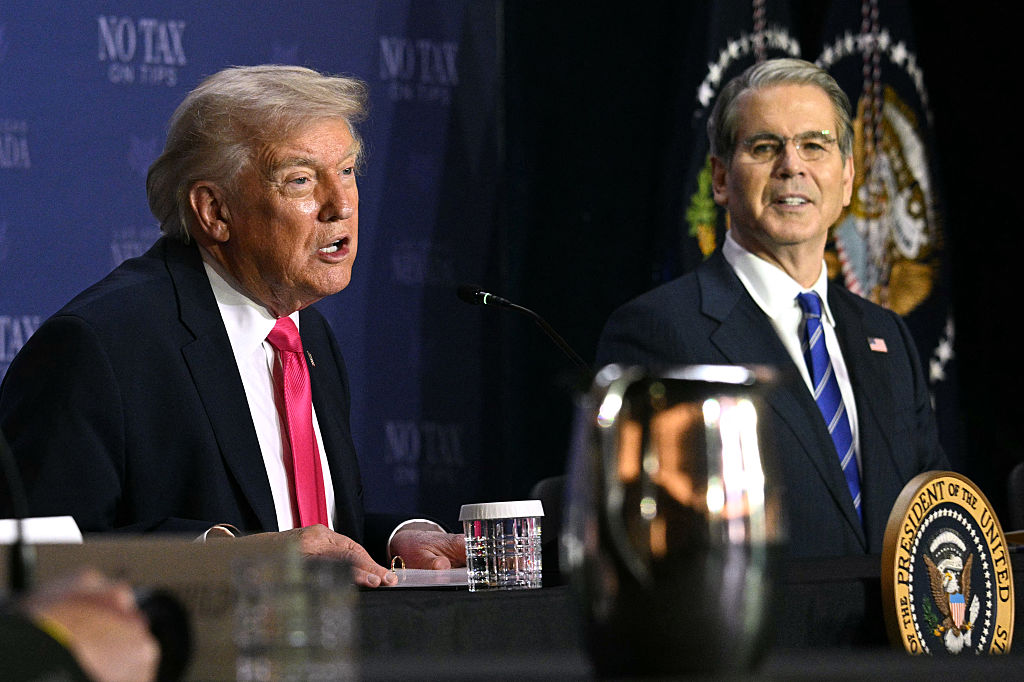 President Donald Trump speaks, flanked by US Secretary of the Treasury Scott Bessent, during a roundtable discussion on his "no tax on tips" policy at the AC Hotel Las Vegas Symphony Park in Las Vegas, Nevada, on April 16, 2026.