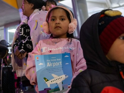 Undocumented Ecuadorian immigrant Jazlyn, six, and her cousin Adrian, three, arrive to JFK International Airport for a flight to Ecuador with their mothers on October 26, 2025, in New York, New York.