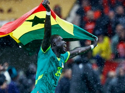 Senegal's defender El Hadji Malick Diouf celebrates his team’s victory at the end of the Africa Cup of Nations on January 18, 2026.
