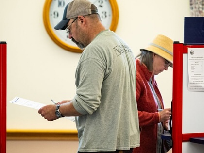 Voters cast their ballots at a polling location inside Ellsworth City Hall during a primary election in Ellsworth, Maine, on Tuesday, June 9, 2026.