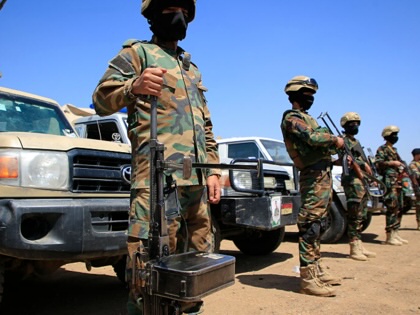 Yemeni soldiers stand guard as supporters of the Huthi movement rally in solidarity with Iran and Lebanon in Sanaa, Yemen, on April 8, 2026.