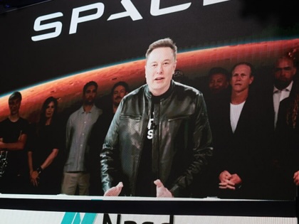 Elon Musk, founder and CEO of SpaceX, speaks via video before the ringing of opening bell at the Nasdaq Marketsite at the launch of the company’s initial public offering (IPO) on June 12, 2026, in New York City.