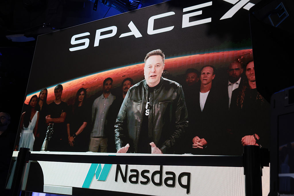 Elon Musk, founder and CEO of SpaceX, speaks via video before the ringing of opening bell at the Nasdaq Marketsite at the launch of the company’s initial public offering (IPO) on June 12, 2026, in New York City.