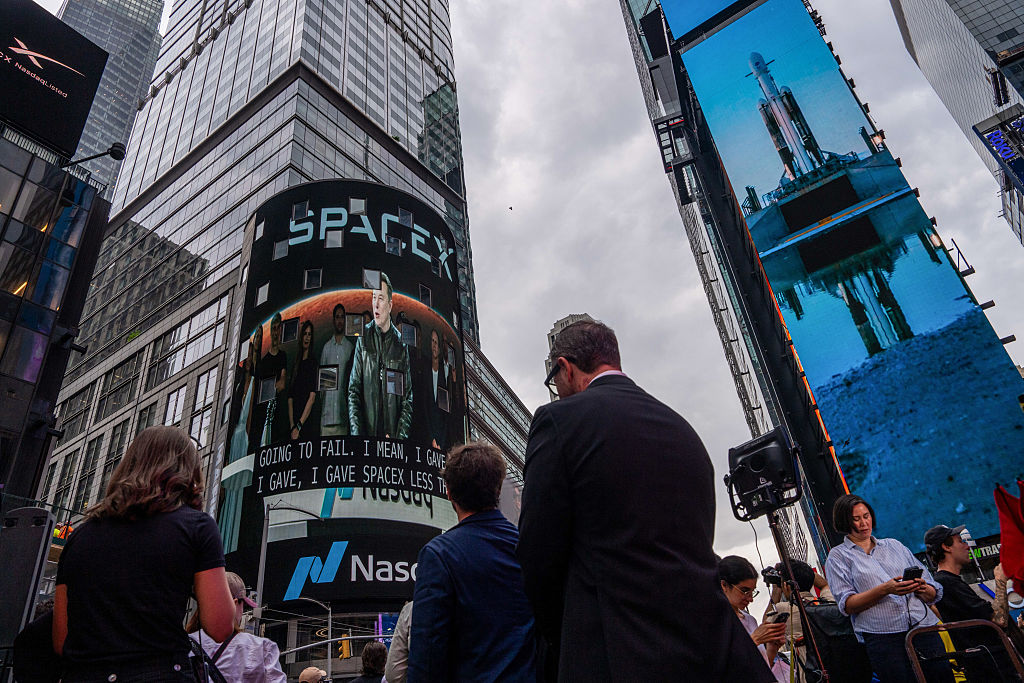 Elon Musk, founder of SpaceX, on screen during the company's initial public offering at the Nasdaq MarketSite in New York City on Friday, June 12, 2026.