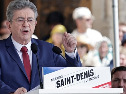 Jean-Luc Mélenchon speaks at a rally in the northern suburb of Paris, Saint-Denis. 