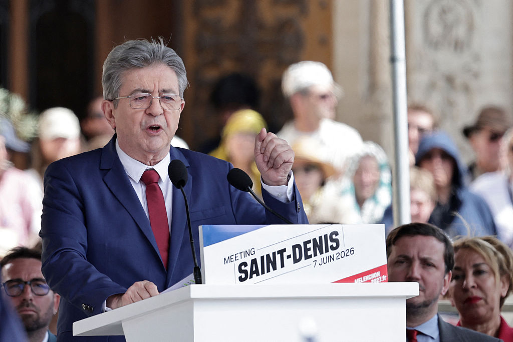 Jean-Luc Mélenchon speaks at a rally in the northern suburb of Paris, Saint-Denis.