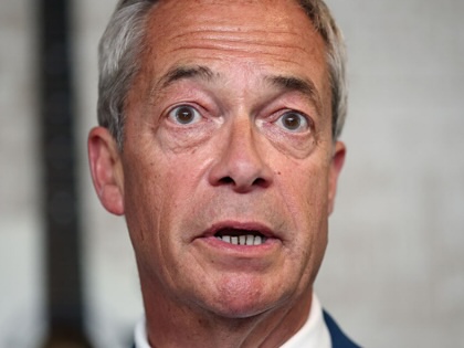 Reform UK leader Nigel Farage speaks to the media at The Dam Bar And Grill on May 8, 2026, in St Helens, England.
