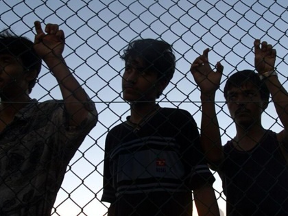Asylum seekers on their first day in the compound at Nauru after their long voyages on the Tampa, Aceng, and Manoora, September 19,  2001.