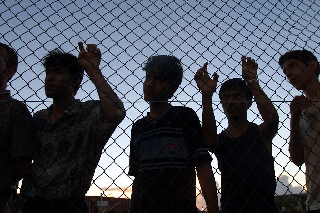 Asylum seekers on their first day in the compound at Nauru after their long voyages on the Tampa, Aceng, and Manoora, September 19,  2001.
