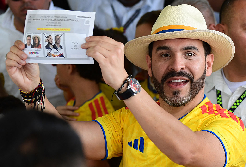President-elect of Colombia, Abelardo de la Espriella, shows off his ballot.