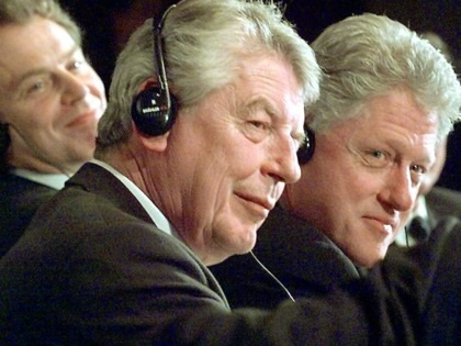 Tony Blair, Wim Kok, and Bill Clinton photographed together at a conference